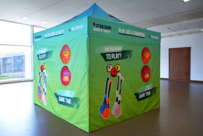 Custom green branded gazebo for O’Brien Ultimate Sports, used for promotional events and outdoor sports in Ireland